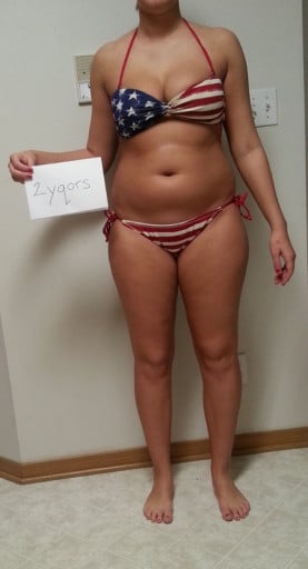 A progress pic of a 5'7" woman showing a snapshot of 166 pounds at a height of 5'7