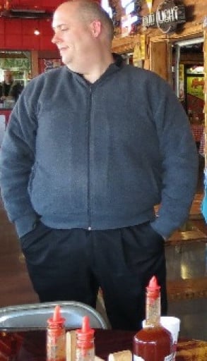 A progress pic of a 6'2" man showing a weight reduction from 311 pounds to 256 pounds. A respectable loss of 55 pounds.