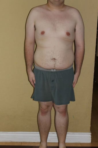 A picture of a 6'1" male showing a snapshot of 233 pounds at a height of 6'1