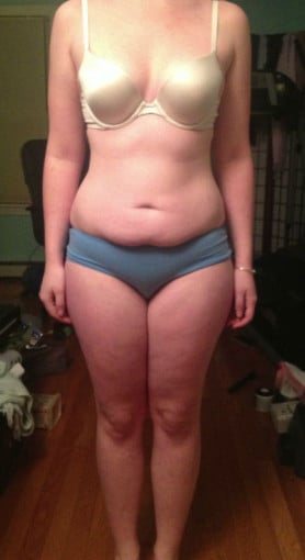 A progress pic of a 5'4" woman showing a snapshot of 129 pounds at a height of 5'4