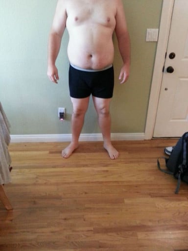 A photo of a 6'0" man showing a snapshot of 295 pounds at a height of 6'0