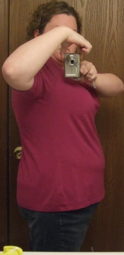 A picture of a 5'8" female showing a weight loss from 309 pounds to 192 pounds. A total loss of 117 pounds.