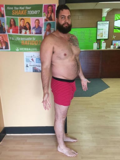 A before and after photo of a 6'3" male showing a weight reduction from 265 pounds to 245 pounds. A net loss of 20 pounds.