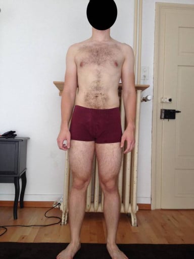 A progress pic of a 5'7" man showing a snapshot of 156 pounds at a height of 5'7