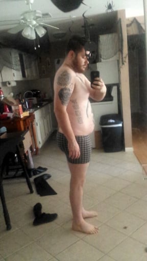A photo of a 5'11" man showing a weight loss from 245 pounds to 222 pounds. A respectable loss of 23 pounds.