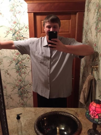 A picture of a 6'6" male showing a weight loss from 330 pounds to 280 pounds. A total loss of 50 pounds.