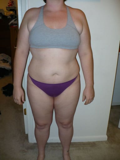 A photo of a 5'10" woman showing a snapshot of 218 pounds at a height of 5'10
