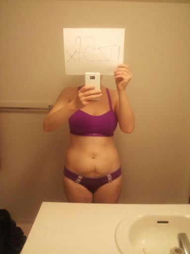 A photo of a 5'8" woman showing a snapshot of 155 pounds at a height of 5'8