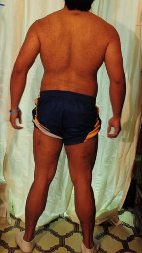 A photo of a 5'7" man showing a weight gain from 169 pounds to 195 pounds. A net gain of 26 pounds.