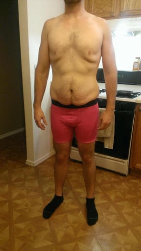 A progress pic of a 6'2" man showing a snapshot of 195 pounds at a height of 6'2