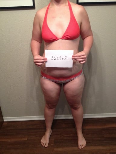 A progress pic of a 5'8" woman showing a snapshot of 183 pounds at a height of 5'8