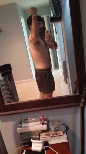 A picture of a 5'10" male showing a weight cut from 206 pounds to 173 pounds. A respectable loss of 33 pounds.