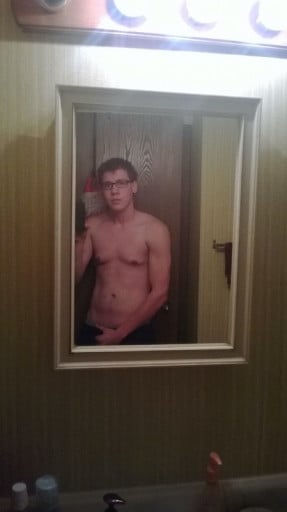 A picture of a 5'8" male showing a weight cut from 210 pounds to 145 pounds. A net loss of 65 pounds.