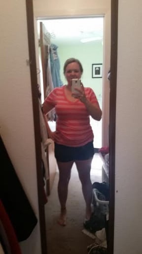 A photo of a 5'3" woman showing a weight reduction from 240 pounds to 175 pounds. A respectable loss of 65 pounds.