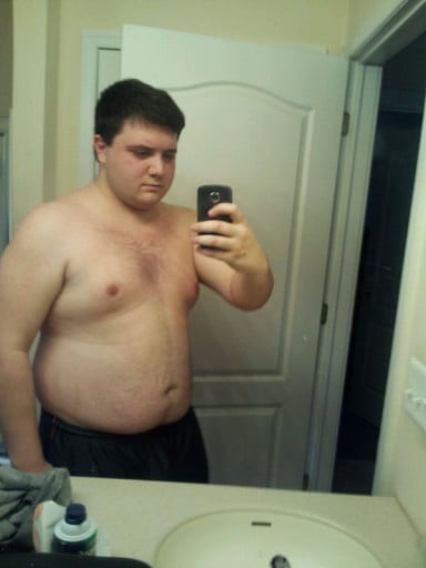 A photo of a 6'0" man showing a fat loss from 282 pounds to 179 pounds. A net loss of 103 pounds.