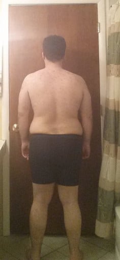 A picture of a 5'8" male showing a snapshot of 220 pounds at a height of 5'8