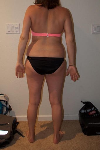 A photo of a 5'5" woman showing a weight loss from 157 pounds to 146 pounds. A net loss of 11 pounds.