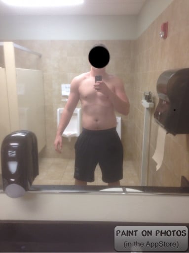 A progress pic of a 6'6" man showing a snapshot of 255 pounds at a height of 6'6