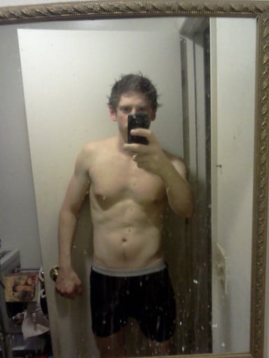 A photo of a 6'2" man showing a muscle gain from 130 pounds to 165 pounds. A net gain of 35 pounds.