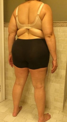 A progress pic of a 5'8" woman showing a weight cut from 279 pounds to 239 pounds. A total loss of 40 pounds.