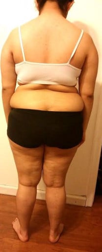 A picture of a 4'11" female showing a snapshot of 146 pounds at a height of 4'11