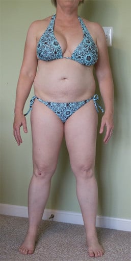 A progress pic of a 5'2" woman showing a snapshot of 147 pounds at a height of 5'2