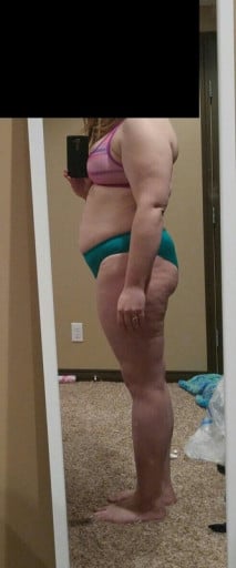 A photo of a 5'6" woman showing a snapshot of 199 pounds at a height of 5'6