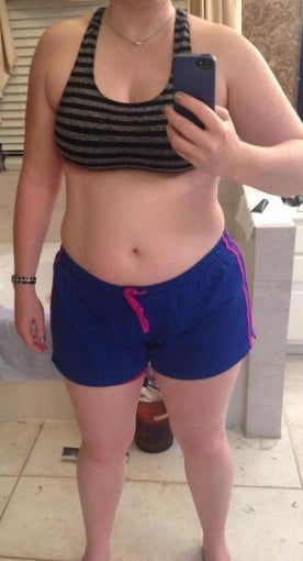 A progress pic of a 5'11" woman showing a snapshot of 213 pounds at a height of 5'11