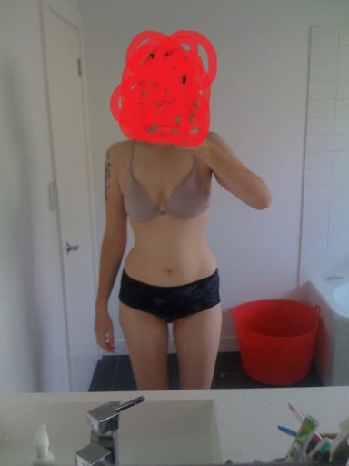A picture of a 5'10" female showing a fat loss from 222 pounds to 154 pounds. A respectable loss of 68 pounds.