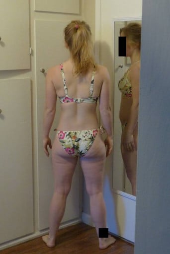 A progress pic of a 5'2" woman showing a snapshot of 121 pounds at a height of 5'2