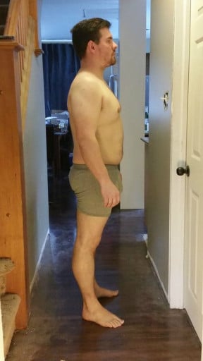 A picture of a 5'9" male showing a snapshot of 209 pounds at a height of 5'9