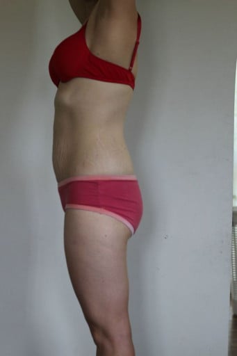 A photo of a 5'3" woman showing a snapshot of 119 pounds at a height of 5'3