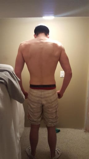 A picture of a 6'6" male showing a fat loss from 215 pounds to 213 pounds. A net loss of 2 pounds.