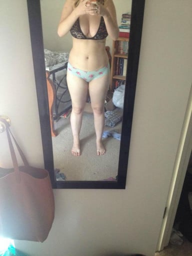 A before and after photo of a 5'5" female showing a weight cut from 147 pounds to 136 pounds. A total loss of 11 pounds.