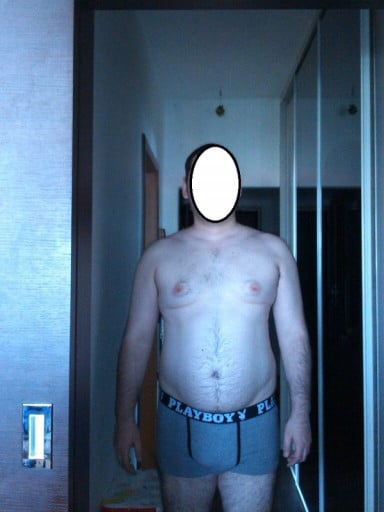 A picture of a 5'11" male showing a weight cut from 235 pounds to 170 pounds. A net loss of 65 pounds.