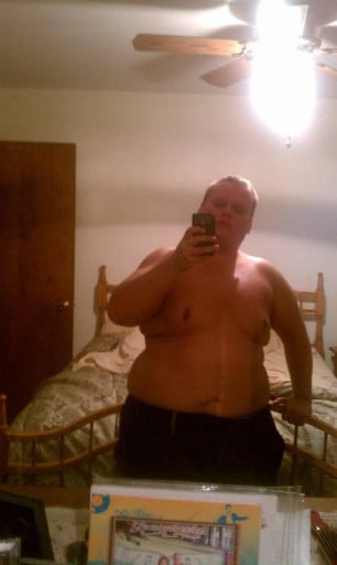 A picture of a 5'8" male showing a weight reduction from 330 pounds to 200 pounds. A total loss of 130 pounds.