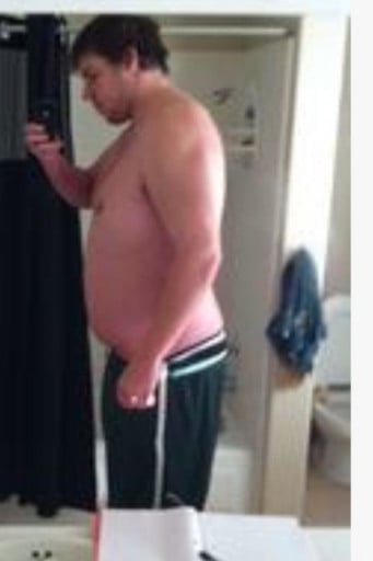 A photo of a 6'8" man showing a weight loss from 350 pounds to 260 pounds. A total loss of 90 pounds.