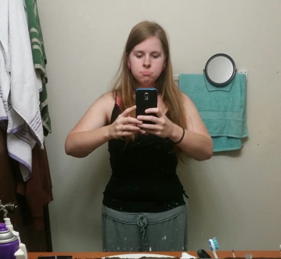 A before and after photo of a 5'2" female showing a weight cut from 267 pounds to 165 pounds. A respectable loss of 102 pounds.