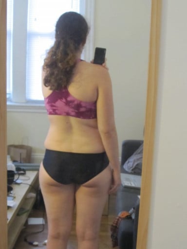 A photo of a 5'5" woman showing a snapshot of 142 pounds at a height of 5'5