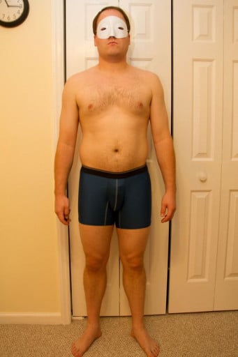 A photo of a 5'11" man showing a snapshot of 189 pounds at a height of 5'11