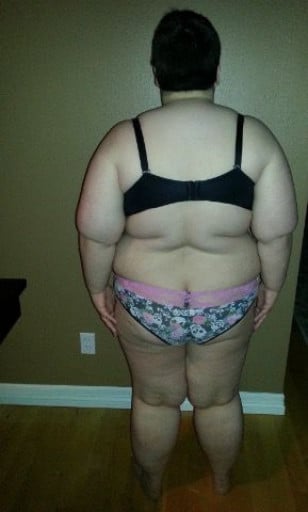 A progress pic of a 5'5" woman showing a snapshot of 310 pounds at a height of 5'5