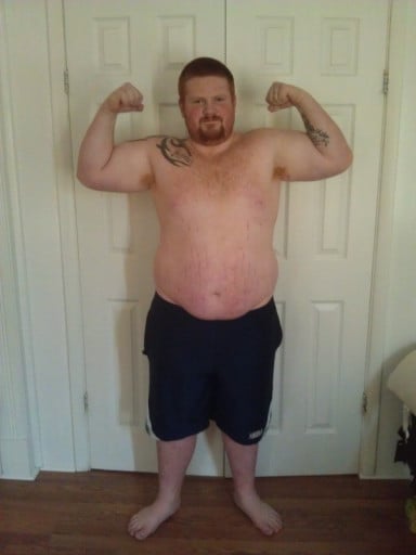 A photo of a 5'9" man showing a weight cut from 330 pounds to 220 pounds. A total loss of 110 pounds.