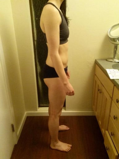 A progress pic of a 5'4" woman showing a snapshot of 117 pounds at a height of 5'4