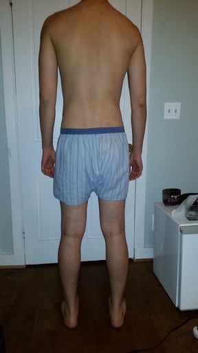A picture of a 6'1" male showing a snapshot of 165 pounds at a height of 6'1
