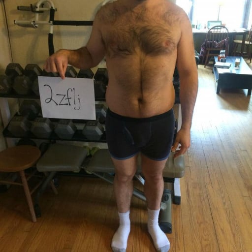 A photo of a 5'11" man showing a snapshot of 216 pounds at a height of 5'11