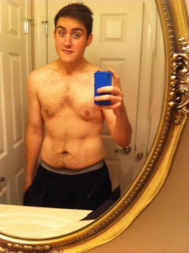 A photo of a 6'1" man showing a weight cut from 315 pounds to 210 pounds. A total loss of 105 pounds.