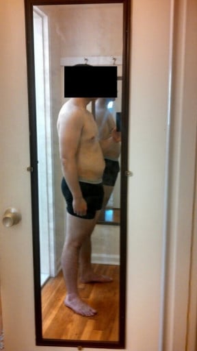 A progress pic of a 5'7" man showing a snapshot of 186 pounds at a height of 5'7