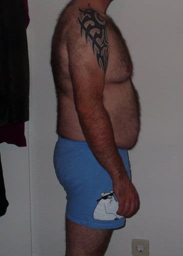 A picture of a 5'9" male showing a snapshot of 196 pounds at a height of 5'9