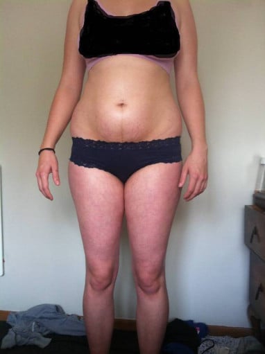 A picture of a 5'7" female showing a weight cut from 171 pounds to 129 pounds. A respectable loss of 42 pounds.