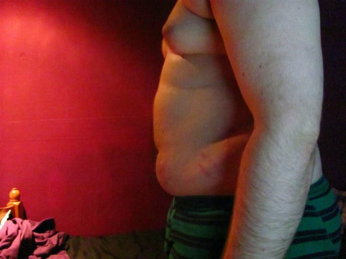 A picture of a 5'11" male showing a fat loss from 265 pounds to 217 pounds. A total loss of 48 pounds.